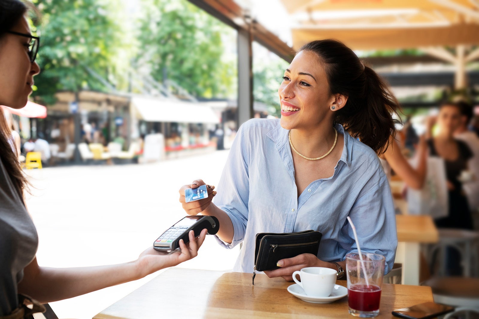 Woman making card payment.